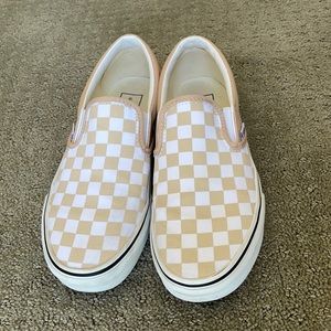 White and tan checkered Vans Slip Ons